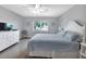 Well-lit bedroom showcasing a comfortable bed, bright window, and functional furnishings for a relaxing atmosphere at 859 Napoli Ln, Punta Gorda, FL 33950