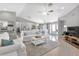 Bright, open-concept layout with tile flooring seamlessly connects the living and dining areas at 859 Napoli Ln, Punta Gorda, FL 33950