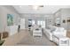 Open floor plan featuring a bright living area, stylish decor, and tile flooring at 859 Napoli Ln, Punta Gorda, FL 33950