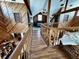Hallway with wood accents, contrasting carpet and wood floors, and great views at 8754 King St, Placida, FL 33946