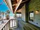 A view from the porch, near a window and overlooking the beach with palm trees at 8754 King St, Placida, FL 33946