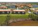 Aerial view of condo complex and amenities at 93 Vivante Blvd # 9344, Punta Gorda, FL 33950