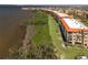 Aerial view of a condo complex by the river at 93 Vivante Blvd # 9344, Punta Gorda, FL 33950