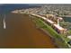 Aerial view of waterfront condo complex and adjacent properties at 93 Vivante Blvd # 9344, Punta Gorda, FL 33950