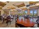 Community dining room with ample seating, natural light, and views of the outdoors at 93 Vivante Blvd # 9344, Punta Gorda, FL 33950