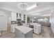 Gourmet kitchen boasts a large island, stainless steel appliances, and lots of natural light at 93 Vivante Blvd # 9344, Punta Gorda, FL 33950