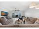 Bright living room with floor to ceiling windows, comfortable seating, and beautiful water views at 93 Vivante Blvd # 9344, Punta Gorda, FL 33950