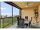 Screened patio with seating area and views of the bay at 93 Vivante Blvd # 9344, Punta Gorda, FL 33950
