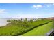 Water view with trees and plants at 93 Vivante Blvd # 9344, Punta Gorda, FL 33950