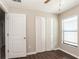 Bright bedroom featuring a ceiling fan, closet, and window with blinds at 10204 Carloway Hills Dr, Wimauma, FL 33598