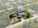 An aerial view of a home with a large lot showcasing the expansive yard and the home's location within the community at 13443 Boabadilla Ln, Port Charlotte, FL 33981