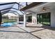 Amazing outdoor living with a screened-in pool and patio for relaxation and entertainment at 13443 Boabadilla Ln, Port Charlotte, FL 33981