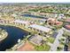 Stunning aerial view of the property showcasing its location on the waterfront with access to waterways at 1345 Mediterranean Dr # A105, Punta Gorda, FL 33950