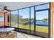Enjoy the spectacular canal views from this lanai's panoramic screened windows at 1345 Mediterranean Dr # A105, Punta Gorda, FL 33950