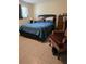 Serene bedroom with a comfortable bed, neutral colors, and an abundance of natural light at 1457 Sheehan Blvd, Port Charlotte, FL 33952