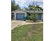 Charming single-story home with a well-maintained front yard and attached garage at 1457 Sheehan Blvd, Port Charlotte, FL 33952