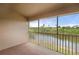 Enjoy the outdoors on this screened balcony with views of a serene body of water and lush greenery at 175 Kings Hwy # B2 1522, Punta Gorda, FL 33983
