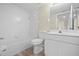 Bright bathroom featuring a clean, white tub and a vanity with contemporary fixtures at 175 Kings Hwy # B2 1522, Punta Gorda, FL 33983