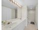 Bathroom features double sinks with sleek countertops, offering a spacious and functional design at 175 Kings Hwy # B2 1522, Punta Gorda, FL 33983