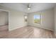Bright, airy bedroom features sleek floors, ceiling fan, and serene views at 175 Kings Hwy # B2 1522, Punta Gorda, FL 33983