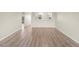 Expansive living room featuring wood-look floors and neutral colors, perfect for relaxing and entertaining guests at 175 Kings Hwy # B2 1522, Punta Gorda, FL 33983
