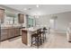 Well-lit kitchen and dining area with modern countertops and stainless steel appliances at 2229 Wakefield St, Port Charlotte, FL 33948