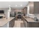 Open kitchen featuring stainless steel appliances and granite countertops at 2229 Wakefield St, Port Charlotte, FL 33948