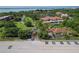 Community aerial view, highlighting the well-maintained grounds and secure entrance at 23465 Harborview Rd # 842, Port Charlotte, FL 33980
