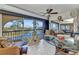 Screened balcony with water view and comfortable seating at 23465 Harborview Rd # 842, Port Charlotte, FL 33980