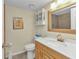 Clean bathroom with modern fixtures, a single sink vanity, and a shower at 23465 Harborview Rd # 842, Port Charlotte, FL 33980