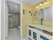 Bright bathroom with glass shower, white vanity, and modern fixtures at 23465 Harborview Rd # 842, Port Charlotte, FL 33980