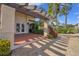 Exterior of clubhouse with columns, pavers and lush landscaping at 23465 Harborview Rd # 842, Port Charlotte, FL 33980