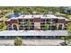 Attractive multi-story condominium building with a pond, and covered parking at 23465 Harborview Rd # 842, Port Charlotte, FL 33980