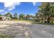 Outdoor storage area featuring boats on trailers under the bright blue sky at 23465 Harborview Rd # 842, Port Charlotte, FL 33980