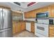Functional kitchen featuring stainless steel appliances, bright lighting, and plenty of storage at 23465 Harborview Rd # 842, Port Charlotte, FL 33980