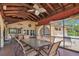 Community outdoor patio with ceiling fans, tables, and chairs for entertaining at 23465 Harborview Rd # 842, Port Charlotte, FL 33980