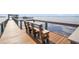 Relax on this wooden pier bench with waterfront views and a cool ocean breeze at 23465 Harborview Rd # 842, Port Charlotte, FL 33980
