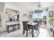 Cozy dining area adjacent to a breakfast bar and featuring seamless access to the outdoor pool at 242 Seminole Nw Blvd, Port Charlotte, FL 33952