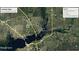 Aerial view showcasing the property's location near Charlotte Harbor and the Peace River at 3249 Cedarbrook Dr, Punta Gorda, FL 33982