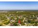 Overhead photograph of home in a lush green neighborhood at 3476 Brewster Rd, North Port, FL 34288