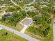 Aerial view of a well-placed home in a quiet neighborhood at 3476 Brewster Rd, North Port, FL 34288