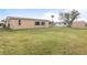 Spacious backyard with lush grass and ample room for outdoor activities at 3480 Pinetree St, Port Charlotte, FL 33952