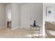 Bright entryway featuring tile floors and modern decor at 3480 Pinetree St, Port Charlotte, FL 33952