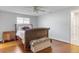 Main bedroom with classic design, featuring hardwood floors and comfortable furniture at 3480 Pinetree St, Port Charlotte, FL 33952