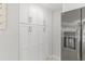 Large pantry with ample storage and shelving, conveniently located near stainless steel refrigerator at 3480 Pinetree St, Port Charlotte, FL 33952