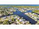 A captivating aerial view of the waterfront community with extensive canal system at 4178 Rose Arbor Cir, Port Charlotte, FL 33948