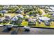 Waterfront homes boast private docks, screened lanais, and lush landscaping along the canal at 4178 Rose Arbor Cir, Port Charlotte, FL 33948