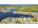 Aerial view of canal front homes, showcasing waterfront living and community layout with vast waterway access at 4178 Rose Arbor Cir, Port Charlotte, FL 33948
