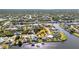 Beautiful aerial view highlighting the waterfront location and boating access at 4178 Rose Arbor Cir, Port Charlotte, FL 33948