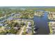 Expansive aerial view highlighting the intricate canal system of this waterfront community at 4178 Rose Arbor Cir, Port Charlotte, FL 33948